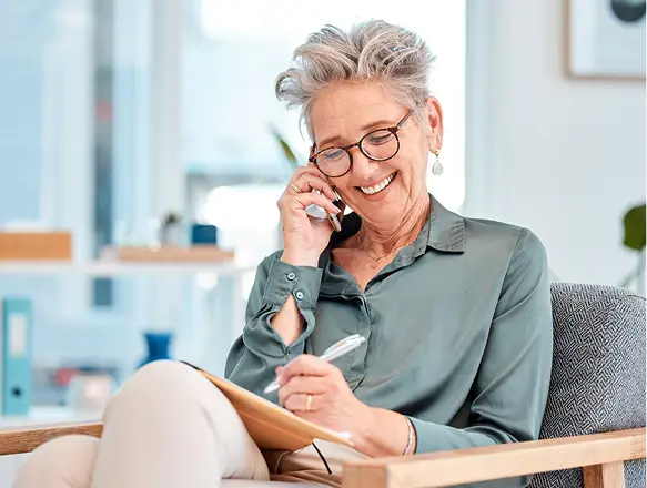 A business owner taking a client call