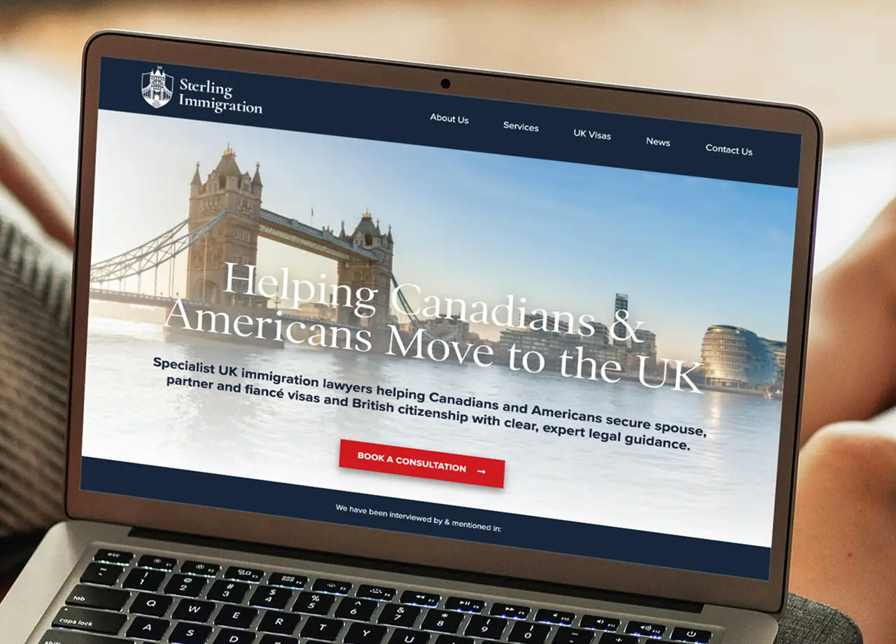 The Sterling Immigration website on a laptop